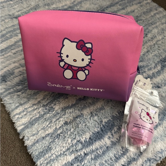 Hello Kitty Handbags - CUTE 😍  NWT Hello Kitty cosmetic bag + blending sponge